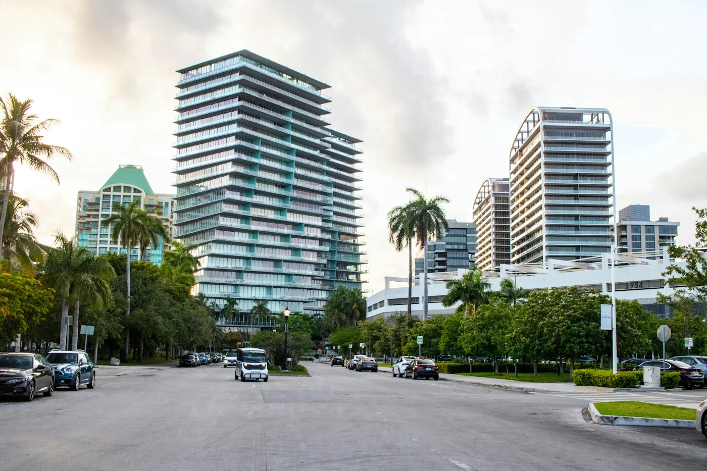 Residential buildings and palms near Bayshore Drive in Coconut Grove, Miami